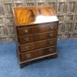 A MAHOGANY REPRODUCTION BUREAU AND A MAHOGANY COFFEE TABLE AND TWO NESTS OF THREE TABLES