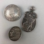 A SILVER PENDANT AND TWO BADGES