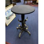 A 20TH CENTURY CIRCULAR OCCASIONAL TABLE