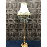 A GILDED WOOD STANDARD LAMP