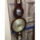 A STAINED WOOD WHEEL BAROMETER