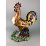 A PORTUGUESE CERAMIC FIGURE OF A COCKEREL