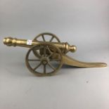 A BRASS MODEL OF A CANNON