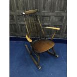 A 1970'S SPINDLE BACK ROCKING CHAIR