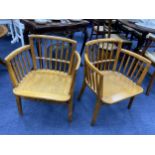 A PAIR OF SPINDLE BACKED ARMCHAIRS