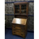 A 20TH CENTURY OAK BUREAU BOOKCASE