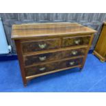 A LATE VICTORIAN WALNUT CHEST OF DRAWERS