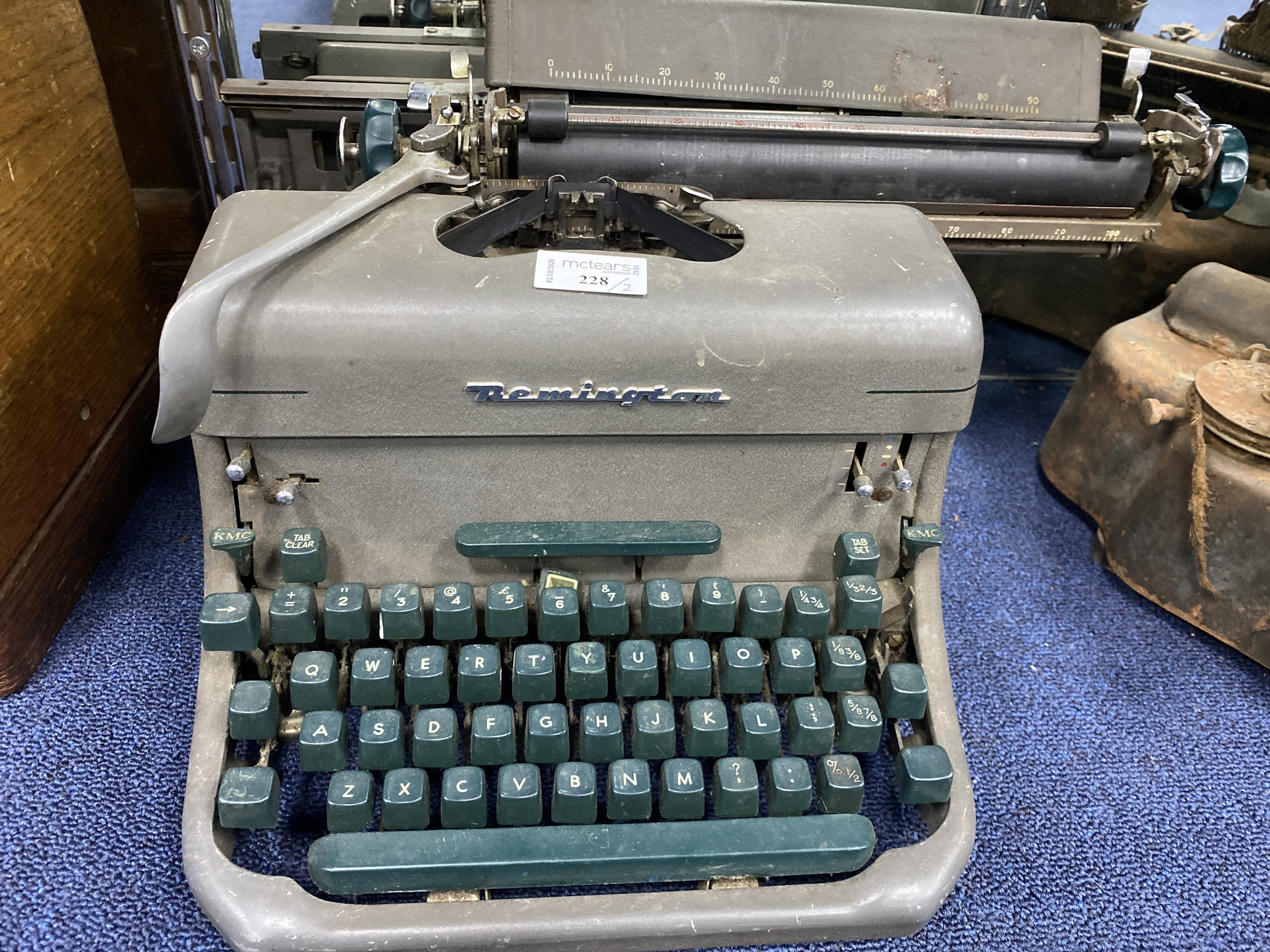 A VINTAGE REMINGTON TYPEWRITER AND ANOTHER