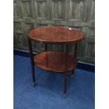 A STAINED WOOD OVAL TWO TIER TROLLEY, CIRCULAR TABLE AND ANOTHER TABLE