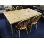 A PINE KITCHEN TABLE AND FOUR CHAIRS