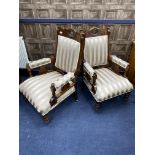 A PAIR OF LATE VICTORIAN WALNUT ARMCHAIRS