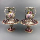 A PAIR OF 19TH CENTURY FLOWER ENCRUSTED VASES AND COMPORTS