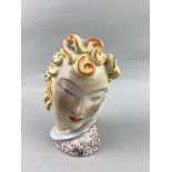 A CONTINENTAL CERAMIC HEAD FIGURE IN THE STYLE OF GOLDSCHEIDER AND OTHER CERAMICS