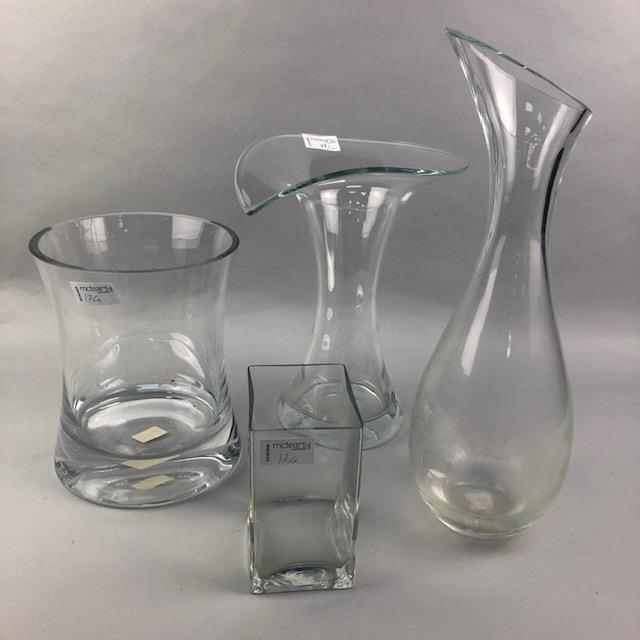 A LOT OF THREE GLASS VASES ALONG WITH A CARAFE AND A LAMP