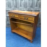 A REPRODUCTION STAINED WOOD OPEN BOOKCASE