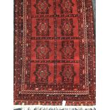 A 20TH CENTURY AFGHAN BOKHARA RUG