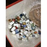 A COLLECTION OF CERAMIC THIMBLES
