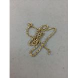 A NINE CARAT GOLD ROPE LINK NECK CHAIN