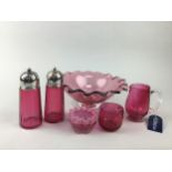 A PAIR OF CRANBERRY GLASS SALT & PEPPER SHAKERS AND OTHER CRANBERRY GLASS WARE