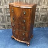 A BOW FRONT CHEST OF DRAWERS