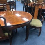 A 20TH CENTURY CHINESE EXTENDING DINING TABLE AND SIX CHAIRS