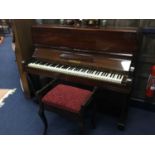AN UPRIGHT PIANO BY NEWMAN ALONG WITH A PIANO STOOL