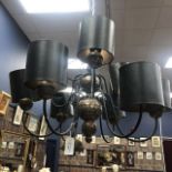 A BRASS AND IRON NINE BRANCH CEILING LIGHT