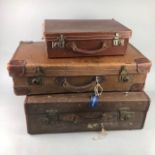 A VINTAGE LEATHER SUITCASE AND TWO OTHERS