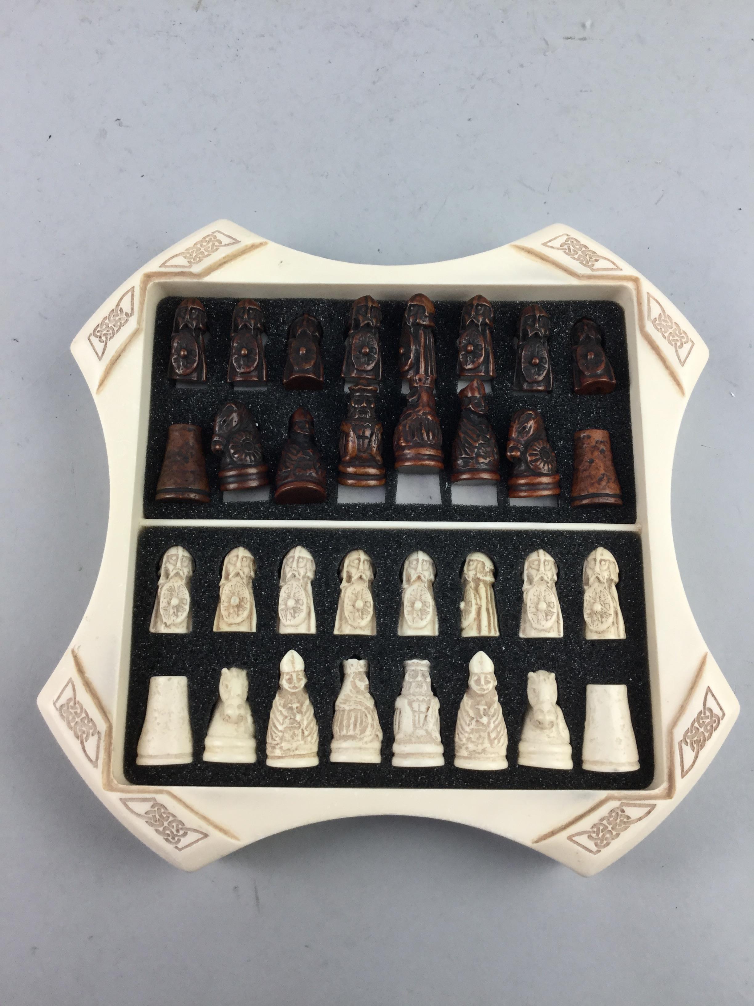 A RESIN ISLE OF LEWIS CHESS SET