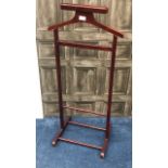 A MAHOGANY VALET STAND