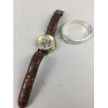 A GENTLEMAN'S ROTARY WRISTWATCH AND A SILVER BANGLE