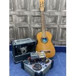 AN ACOUSTIC GUITAR, AMPLIFIER AND OTHER ITEMS