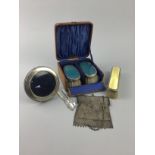 A SILVER PHOTOGRAPH FRAME, SILVER BACKED BRUSHES AND OTHER ITEMS