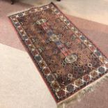 A 20TH CENTURY RUG