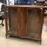 A WALNUT DISPLAY CABINET