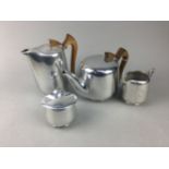 A PICQUOT WARE FOUR PIECE TEA SERVICE AND PLATED SPOONS