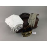 AN EARLY 20TH CENTURY LEATHER GLADSTONE BAG, ANOTHER BAG, GLOVES AND A SCARF