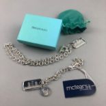 A WHITE METAL BRACELET AND NECKLACE ALONG WITH A TIFFANY & CO BOX