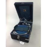 A VINTAGE 'HIS MASTERS VOICE' PORTABLE GRAMOPHONE