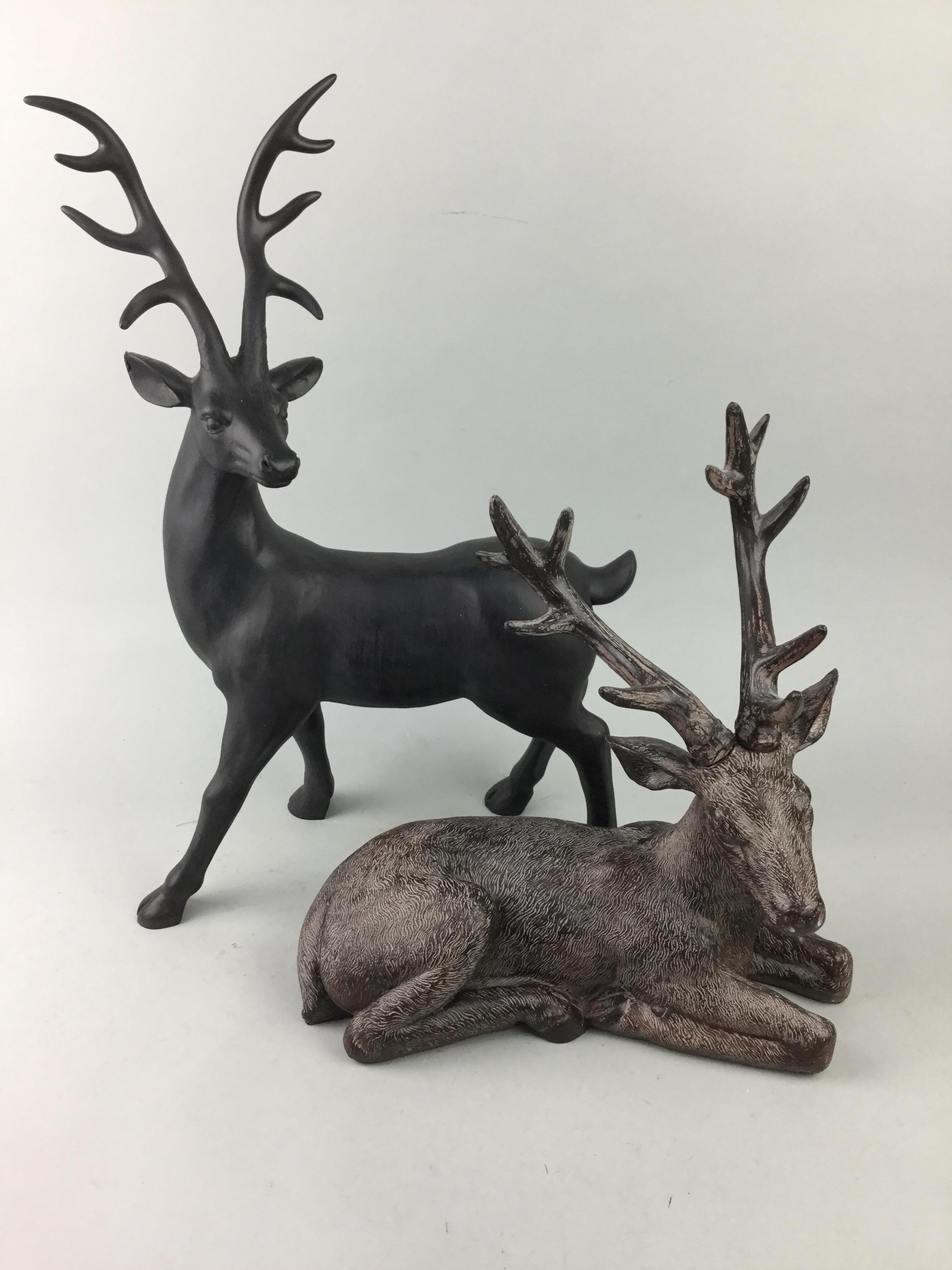 TWO RESIN STAG FIGURES AND OTHERS