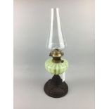 AN OIL LAMP WITH URANIUM GLASS RESERVE