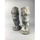 A PAIR OF STONE AND CONCRETE AGGREGRATE GARDEN LION FIGURES