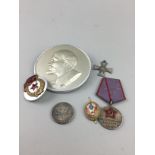 A GROUP OF RUSSIAN MEDALS AND BADGES