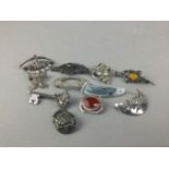 A COLLECTION OF VINTAGE SILVER BROOCHES