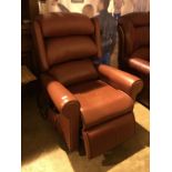 A MODERN BROWN LEATHER RECLINING ARMCHAIR