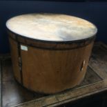 A LARGE STAINED WOOD CIRCULAR HAT BOX