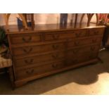 A YEW WOOD SIDEBOARD