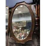 A WALNUT FRAMED WALL MIRROR AND ONE OTHER