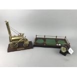 A BRASS MODEL OF STEPHENSON'S ROCKET, DECANTER STAND AND A THERMOMETER