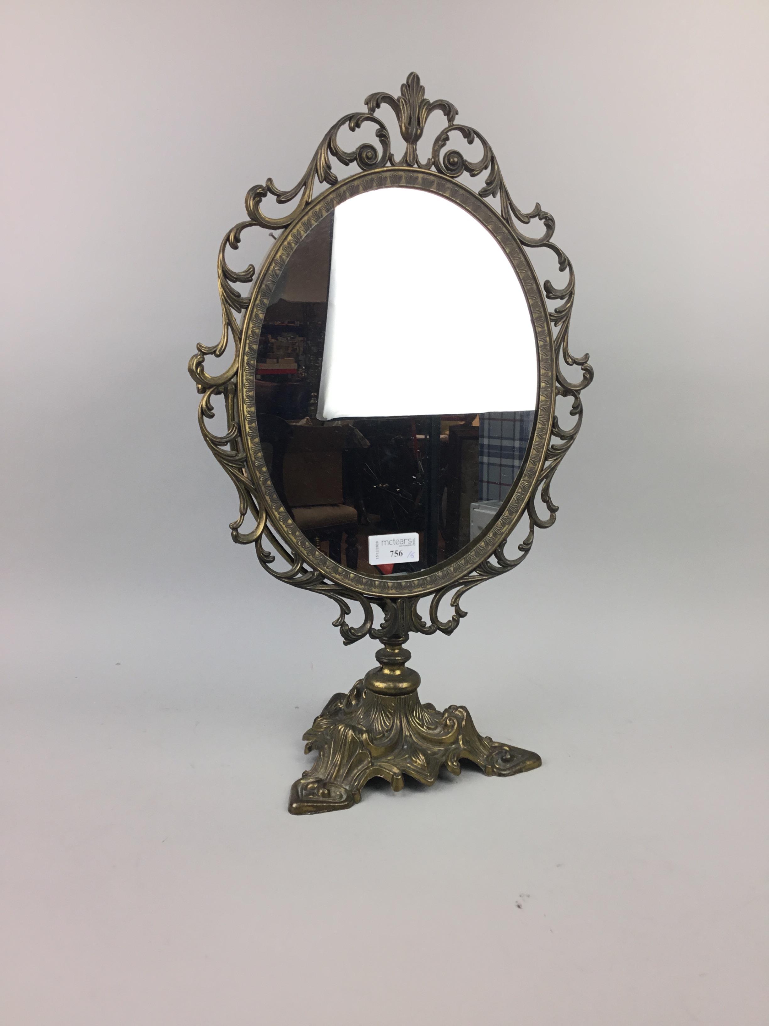 A SILVER PLATED DRESSING MIRROR AND FOUR VANITY MIRRORS